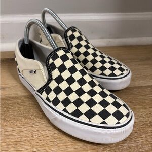 Vans Classic Slip-On Skateboarding Sneakers in White & Black Checkered Print